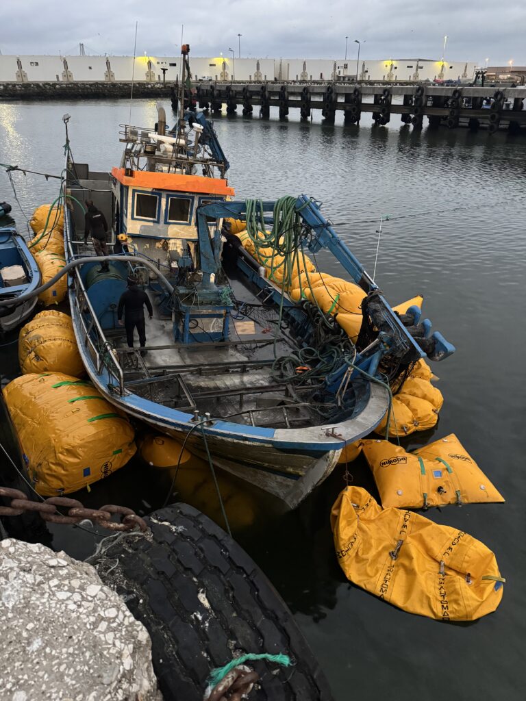 Crew back on deck with the vessel afloat on the lift bags